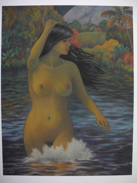 Woman wading in a pond