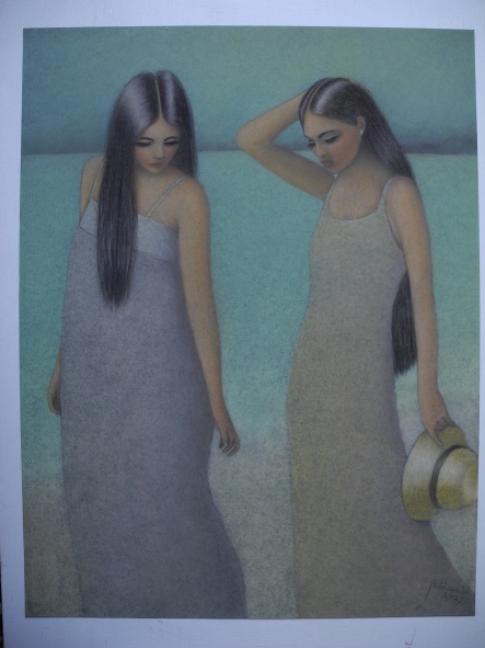 Two ladies chatting on the beach